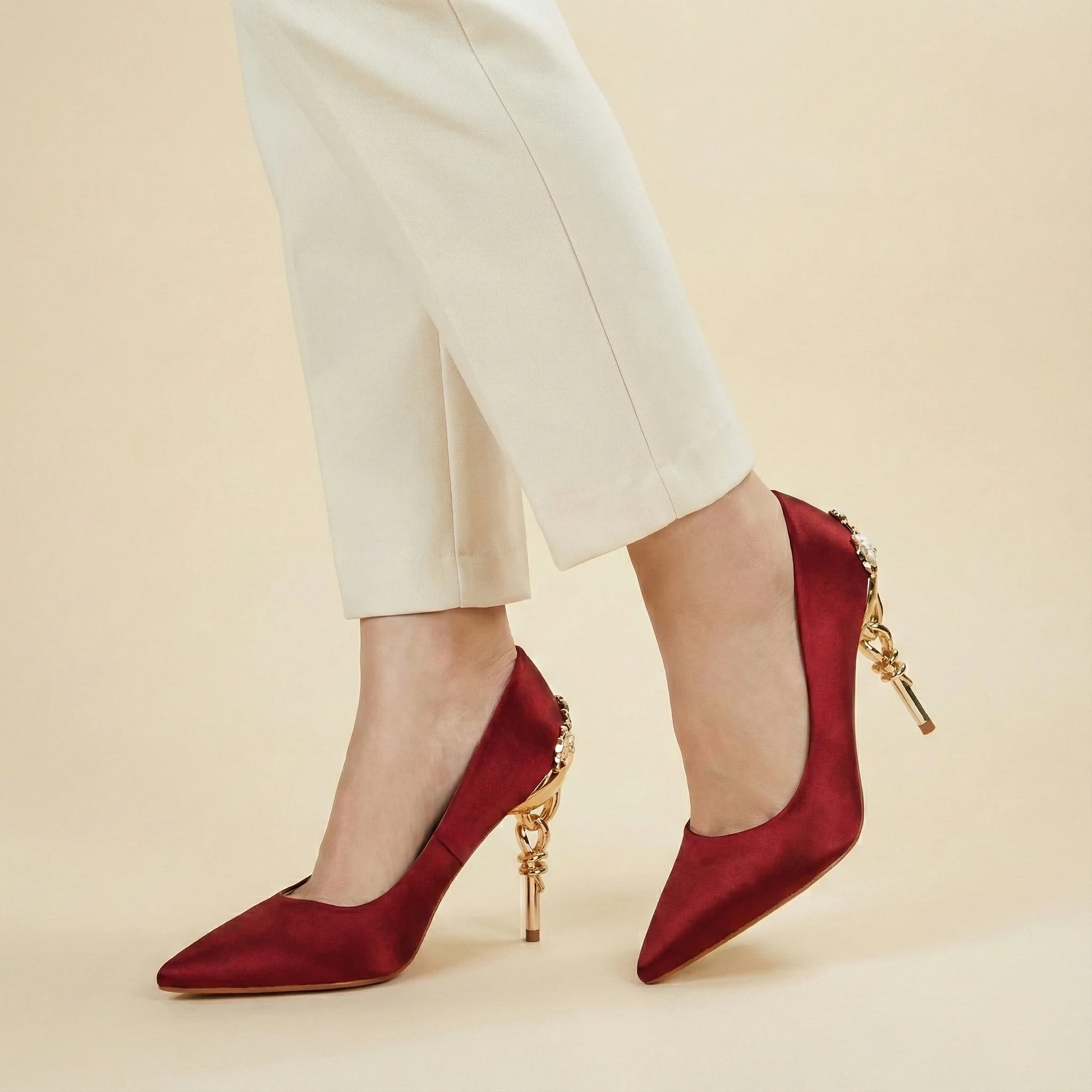 Artistic gold metallic heel structure.